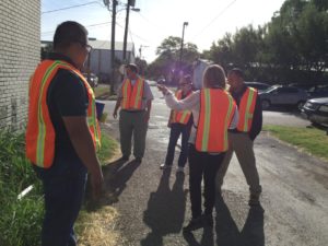 A group discussing a barrier on the route during the walking audit.