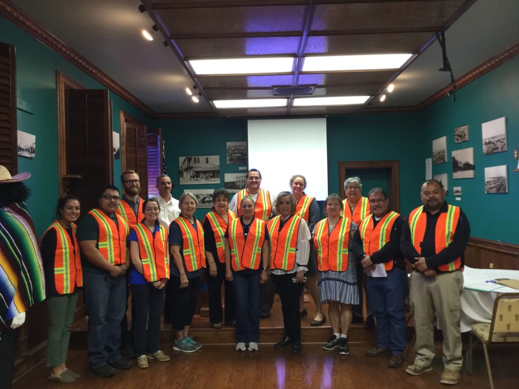 Picture showing the group who attended the workshop in their safety vests ready to conduct the walking audit.
